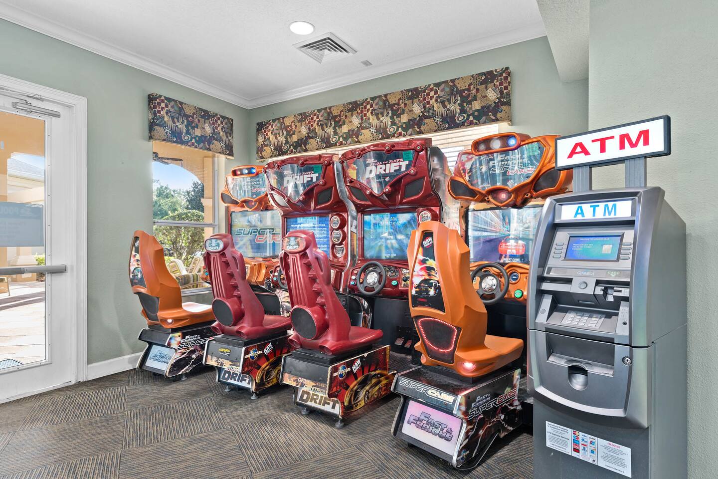 Windsor Hills clubhouse arcade with racing games.